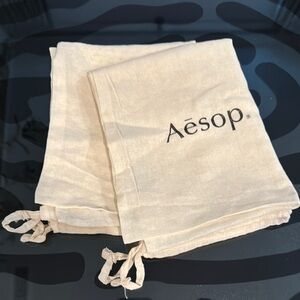 Aesop Cream Drawstring Bags